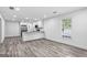Bright living area featuring modern floors, recessed lighting, and an open layout at 849 Wood Nw St, Atlanta, GA 30318