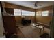 Cozy bedroom with a ceiling fan, rug, and natural light, awaiting renovation at 1198 Lynhurst Sw Dr, Atlanta, GA 30311
