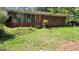 Single story brick home with green space around it at 1198 Lynhurst Sw Dr, Atlanta, GA 30311