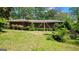 A single-story brick home with an expansive front yard at 1198 Lynhurst Sw Dr, Atlanta, GA 30311
