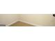 Neutral carpet and base trim in a carpeted room at 305 Wheeler Creek Ln # 21, Mcdonough, GA 30252