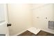 Laundry room with built-in shelving and connections for washer and dryer, maximizing space and functionality at 305 Wheeler Creek Ln # 21, Mcdonough, GA 30252