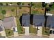 Aerial view of well-manicured lawns and neighboring homes at 1597 Culpepper Ln, Mcdonough, GA 30253