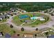 Aerial view of pool, tennis court, playground and other neighborhood amenities at 1597 Culpepper Ln, Mcdonough, GA 30253