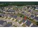 Aerial view of a suburban neighborhood with well-maintained homes and green lawns, showcasing community living at 1597 Culpepper Ln, Mcdonough, GA 30253
