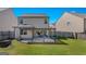 Beautiful backyard with covered patio including black metal frame, lighting and ceiling at 1597 Culpepper Ln, Mcdonough, GA 30253