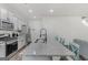 Spacious kitchen featuring a large center island with a sink and breakfast bar seating at 1597 Culpepper Ln, Mcdonough, GA 30253