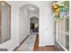 Inviting foyer with hardwood floors, fresh paint and stylish accents create a warm and welcoming atmosphere at 5260 Sherwood Way, Cumming, GA 30040