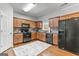 Well-equipped kitchen with modern appliances and ample cabinet space for storage and food preparation at 5260 Sherwood Way, Cumming, GA 30040