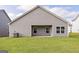 Expansive backyard featuring a gray exterior and ample space for outdoor activities at 289 Limestone Circle, Conyers, GA 30013
