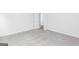 Carpeted bedroom with window and two doors at 289 Limestone Circle, Conyers, GA 30013