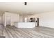 Open concept kitchen with a breakfast bar, stainless appliances, and white cabinets at 289 Limestone Circle, Conyers, GA 30013