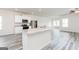 Open kitchen with granite island, stainless appliances, and lots of natural light at 289 Limestone Circle, Conyers, GA 30013