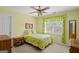 Charming bedroom with cozy bed, soft lighting, and quaint decor at 1108 Sequoia Trl, Mcdonough, GA 30252
