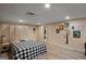 Relaxing bedroom showcases wood floors, a minimalist partition, and artful wall decorations at 1108 Sequoia Trl, Mcdonough, GA 30252