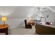 Comfortable bonus room with plush seating, soft lighting, and cozy decor at 1108 Sequoia Trl, Mcdonough, GA 30252