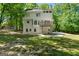 Expansive backyard featuring a deck, patio, and plenty of green space perfect for outdoor living at 9276 Fieldstone Ct, Jonesboro, GA 30236