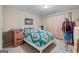 Bedroom featuring cozy decor, carpet floors, and a large window for natural light at 1154 Ridge Hollow Ln, Lawrenceville, GA 30043