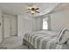 Neutral bedroom with carpet, ceiling fan, and double door closet at 160 Wills Way, Fayetteville, GA 30214