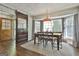 Bright dining room with bay windows and a sliding barn door at 160 Wills Way, Fayetteville, GA 30214