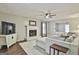 Cozy living room with a fireplace and plush carpeting at 160 Wills Way, Fayetteville, GA 30214