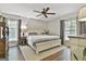 Charming bedroom featuring a ceiling fan and well-lit windows at 160 Wills Way, Fayetteville, GA 30214