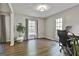 Bright office space with laminate floors and a door leading to the backyard at 160 Wills Way, Fayetteville, GA 30214