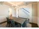 Dining room showcasing coffered ceilings, chandelier, and arched doorways at 44 Mediterranean Ave, Sharpsburg, GA 30277