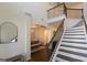 Spacious foyer with high ceilings, staircase, and hardwood floors at 44 Mediterranean Ave, Sharpsburg, GA 30277