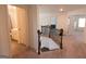 Upstairs hallway with carpet flooring, access to bedrooms, and stairway to downstairs at 44 Mediterranean Ave, Sharpsburg, GA 30277
