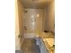 Bathroom features tile backsplash, granite countertop sink, and updated shower and bath at 5949 Tyree Rd, Winston, GA 30187