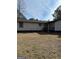 The side of the home is white with black trim and a small back porch at 5949 Tyree Rd, Winston, GA 30187