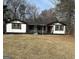 Charming single-story home with a well-maintained front yard and cozy curb appeal at 5949 Tyree Rd, Winston, GA 30187