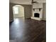 Spacious living room with wood floors and a charming fireplace feature at 5949 Tyree Rd, Winston, GA 30187