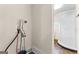 Laundry area with washer and dryer hookups, located adjacent to a full bathroom at 2354 Hamilton St, Hampton, GA 30228