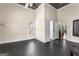 Bright room with dark vinyl floors and natural light, creating an airy feel at 2354 Hamilton St, Hampton, GA 30228