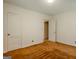 Bedroom with neutral walls, carpet, and two closets and a view to another room at 395 Hood Ave, Fayetteville, GA 30214