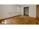 Bedroom with neutral walls, carpet, a closet and a window with a view at 395 Hood Ave, Fayetteville, GA 30214