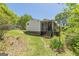 View of screened porch and lush green yard at 1325 E Forrest Ave, East Point, GA 30344