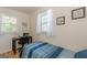 This cozy bedroom includes a work desk and windows that provide plenty of natural lighting at 1325 E Forrest Ave, East Point, GA 30344