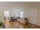 Inviting living room with beautiful floors, neutral walls, and a bright, open feel at 1325 E Forrest Ave, East Point, GA 30344