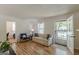 Inviting living room with beautiful floors, neutral walls, and a bright, open feel at 1325 E Forrest Ave, East Point, GA 30344