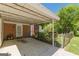 Covered patio area with brick accents, offering a cozy outdoor space at 1325 E Forrest Ave, East Point, GA 30344