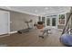 Basement exercise room features wood floors, French doors, and ample workout equipment at 1105 Astoria Ln, Peachtree City, GA 30269