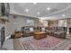 Spacious finished basement with comfortable leather seating, a plush rug, and accent decor at 1105 Astoria Ln, Peachtree City, GA 30269