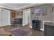 Finished basement featuring a bar area, adjacent bathroom, and a decorative area rug at 1105 Astoria Ln, Peachtree City, GA 30269