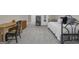 Bedroom features a daybed, carpet floors, and a desk for a functional and comfortable space at 1105 Astoria Ln, Peachtree City, GA 30269