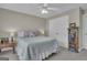 Relaxing bedroom featuring a comfortable bed, soft lighting, and a practical storage shelf for a cozy feel at 1105 Astoria Ln, Peachtree City, GA 30269