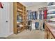 Spacious walk-in closet with custom shelving and ample storage for clothes and accessories at 1105 Astoria Ln, Peachtree City, GA 30269