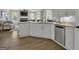 Modern kitchen with stainless steel dishwasher and granite countertops at 1105 Astoria Ln, Peachtree City, GA 30269